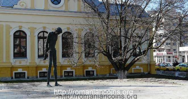 statue of George Bacovia in downtown Bacău, creation of Romanian sculptor Constantin Popovici (1938 - 1995), unveiled in 1971, when 90 years since the birth of the poet were celebrated - photo 9th of February 2011