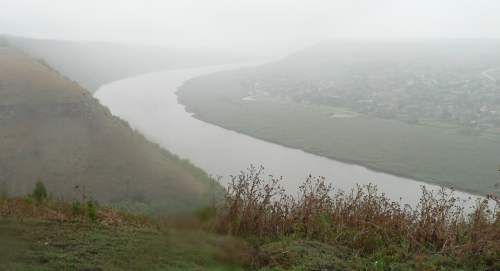 the bend of River Nistru that shelters the village of Z�zuleni, seen from the rock of ��pova Monastery - picture taken in September 2008